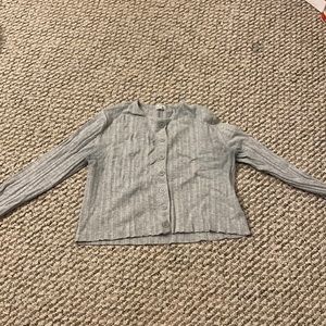 gray cropped button up sweater.